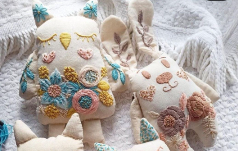 embroidery detail on custom plush toy sample