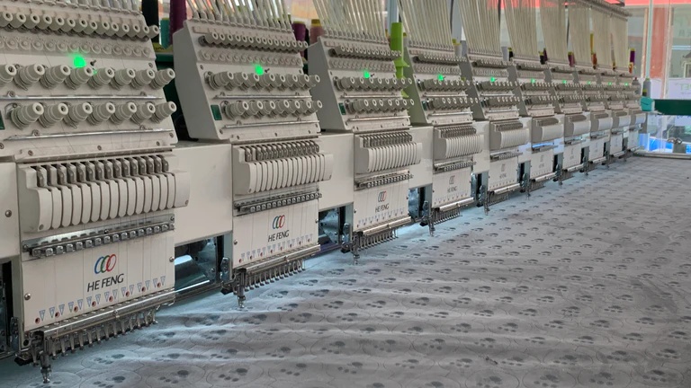 Industrial embroidery machines for custom hats